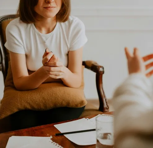 Woman in conversation during a counselling session